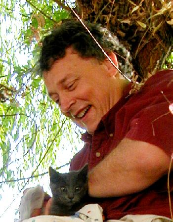 Uncle Bob rescuing Lightning from the tree